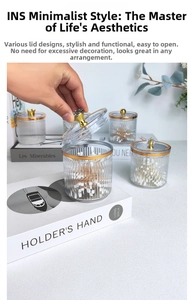 Detailed view of luxury vertical stripe glass canister with gold rim and crown lid