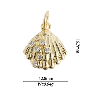 Detailed view of a gold shell pendant with cubic zirconia inlay and measurements