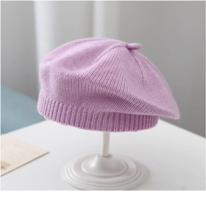 Detailed view of light purple knit beret showing soft texture and premium weave pattern