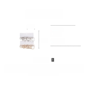 Detailed view of 12-piece geometric silver hoop earring set in gold and silver finish