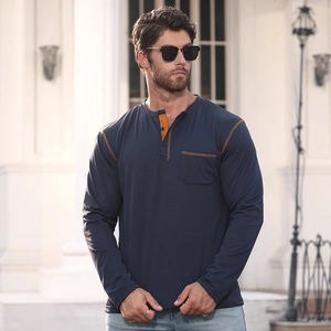 Men's navy long sleeve Henley shirt with orange contrast stitching and chest pocket