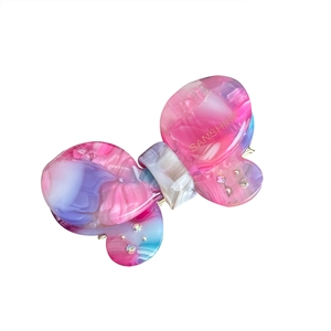 Pink and blue acetate butterfly hair clip with rhinestones and gold SANSHINE lettering