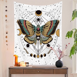 Detail of bohemian butterfly tapestry with zodiac signs and moon phases in home setting