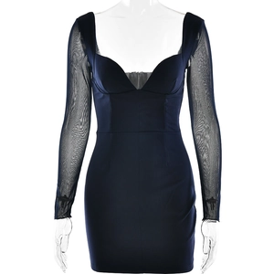 Detail of navy blue dress with sheer mesh long sleeves and a sweetheart neckline cut