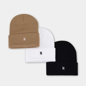Minimalist knit beanie hats in camel, white, and black with letter N embroidery