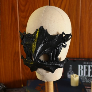 Japanese style black and yellow tiger skeletal half-face cosplay mask on a head model