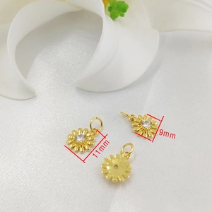 14K gold plated sunflower pendants with zircon accents in 11mm and 9mm sizes