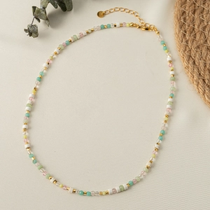 Colorful beaded necklace with natural stones and gold accents for a fresh summer look
