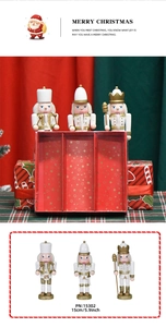 Detailed view of 15cm white and gold wooden nutcracker soldier set in a red gift box