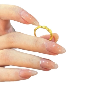 Minimalist twisted golden open ring with a textured wavy design for daily wear