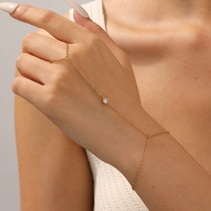 Bracelet bague en acier inoxydable plaqué or 18 carats avec une pierre de zircone ronde