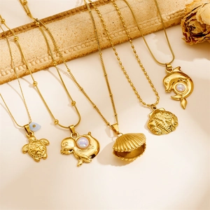 Gold plated stainless steel ocean necklaces with starfish turtle and dolphin pendants