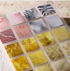 Detailed palette of 16 nail art foil colors featuring marble and matte textures