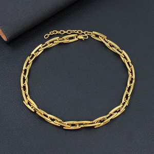 Detailed shot of gold-plated thick rectangle link chain with lobster clasp and extension