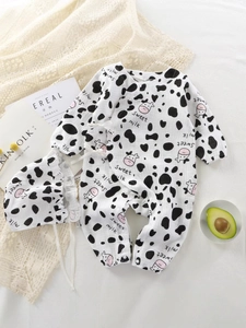Breathable cotton baby romper set with sweet milk cow print and matching hat