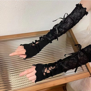 Gothic black lace arm warmers with silk bow lace-up ribbons in Y2K ballet style