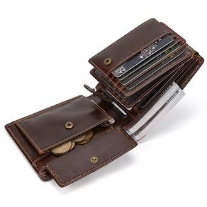 Macro view of dark brown leather wallet showing coin pocket, card slots, and cash compartment