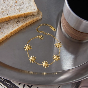 Bracciale classico in acciaio inossidabile placcato oro 18K con cinque motivi a sole