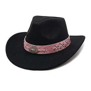 Detail of black felt cowboy hat with bohemian pink jacquard band and vintage metal buckle