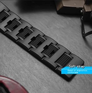 Detail of black sports watch strap with ergonomic mesh texture and comfortable fit