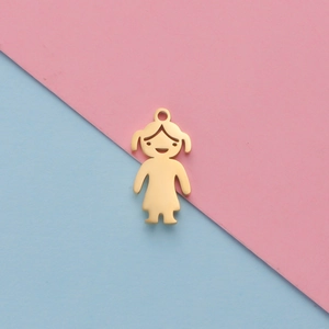 Polished gold-plated girl pendant charm for DIY jewelry on a pink and blue background