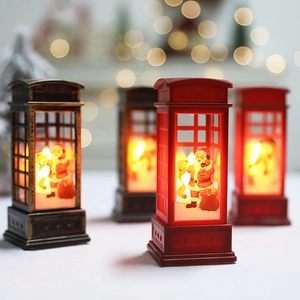 Festive Christmas telephone booth LED lantern with Santa silhouette in red and bronze finish