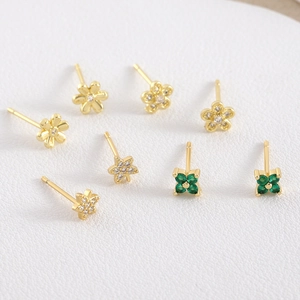 Elegant gold zircon flower and star stud earrings set with green clover accents