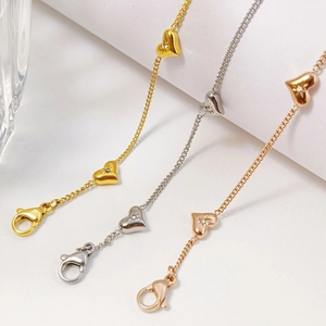 Elegant heart-shaped charm bracelets with inlaid crystals in gold, silver, and rose gold