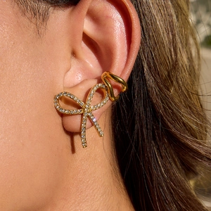 Golden bow ear cuff set with sparkling crystals and minimalist ring for women
