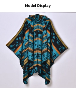Detailed ethnic pattern and bohemian knit texture of the hooded women's winter poncho