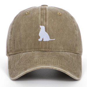 Detailed view of khaki washed cotton baseball cap with white dog embroidery and vintage texture