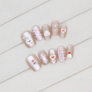 Cute pink cat eye press-on nails with hand-painted animal patterns and heart designs