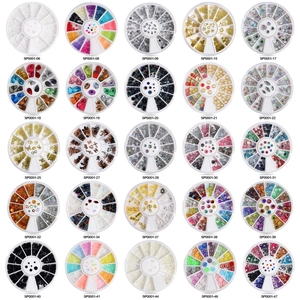 Nail art decoration set with 25 wheels of iridescent rhinestones and metal studs