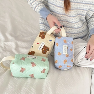 Quilted cartoon bear organizer bags in mint, beige, and blue with fabric handle