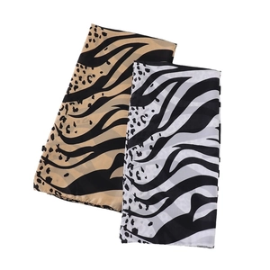 Retro leopard print scarf with breathable silk-like fabric in black and beige patterns