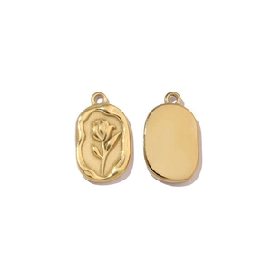 Detailed view of gold stainless steel pendants with rose relief and polished back side