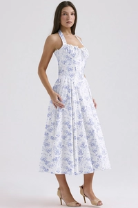 Detail of blue and white Toile de Jouy print on a slim fit halter neck summer dress