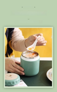 Macro view of mint green soup cup with wooden lid showing spoon scooping porridge
