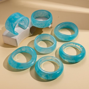 Minimalist blue marble resin bangle set with 7 geometric circular bracelets for women