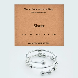 Detail showing Morse code anxiety ring for sisters with 316L stainless steel beads