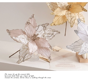 Close-up of artificial glitter Christmas flowers in pink, gold, and silver finishes