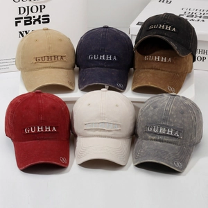 Vintage washed cotton baseball caps with GUHHA embroidery in six assorted colors