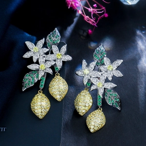 Elegant floral and lemon drop earrings with pavé set yellow and green zircons