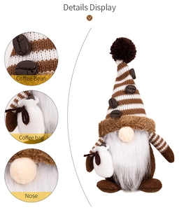Detail showing striped knit hat with coffee beans and mini coffee bag on gnome