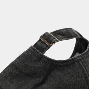 Detailed back view of charcoal grey baseball cap showing vintage metal buckle closure