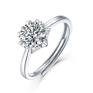 Detail of a sparkling round D-color Moissanite set in a 925 sterling silver adjustable ring