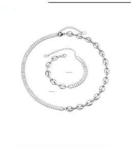 Detailed view of titanium steel coffee bean necklace and bracelet with baguette zircon
