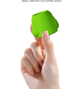 Green silicone pet shower head for water bottles showing its compact size and portability