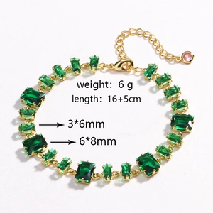 Detail shot of green zircon bracelet with gold alloy finish showing length and gem dimensions