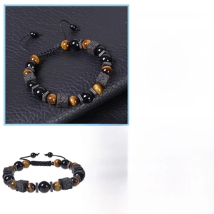 Detailed view of tiger eye and lava rock beaded bracelet with adjustable woven cord